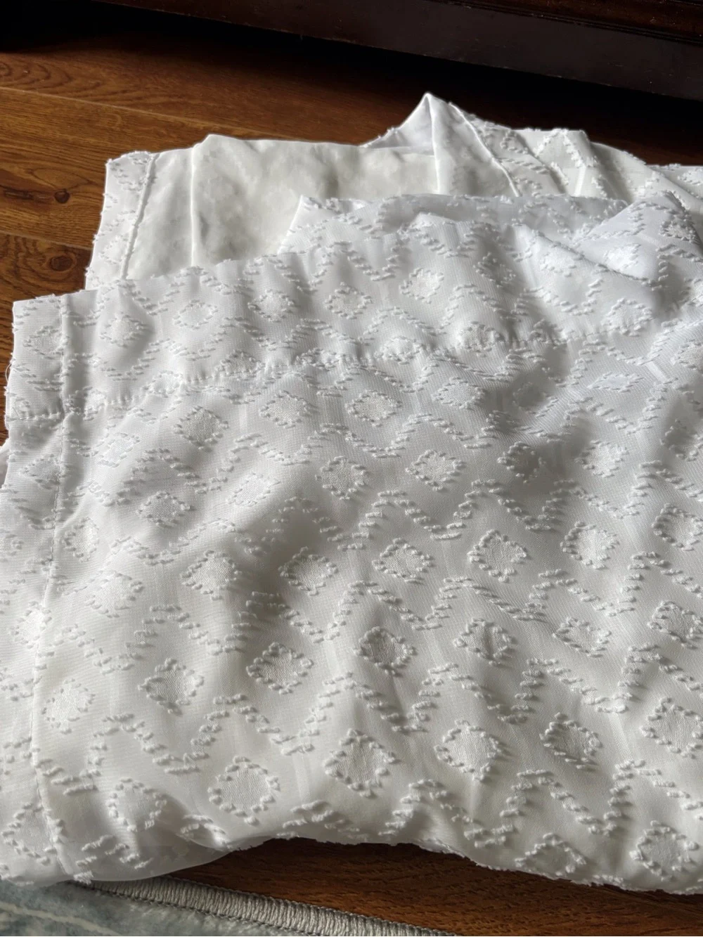 white textured curtain panel
